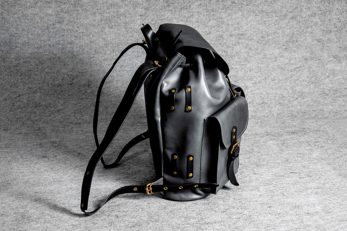 black leather motorcycle backpack WOLFPACK and a micro Fringe Motorcycle Jacket Backpack
